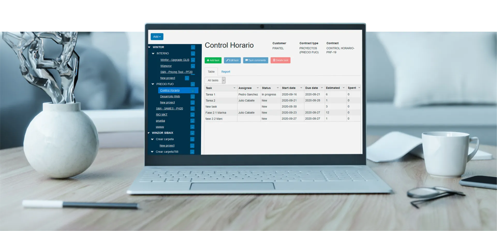 Project management dashboard shown on a laptop